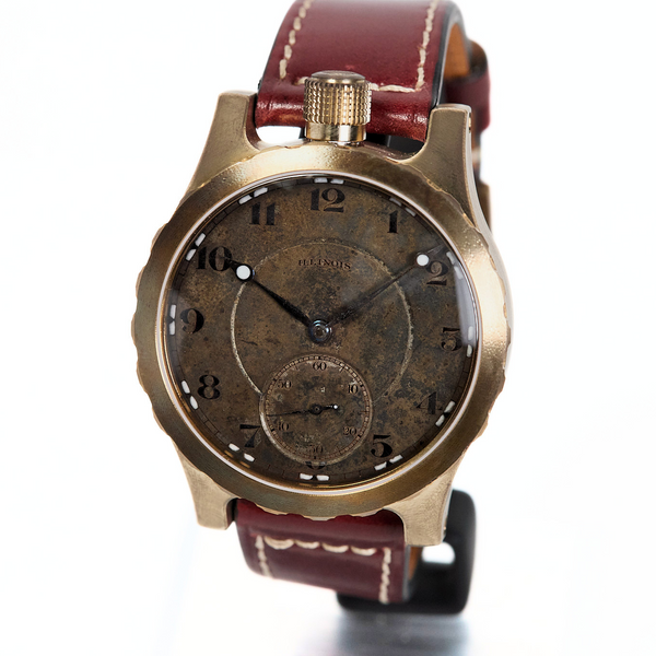 Vintage-style watch with brown leather strap on a white background