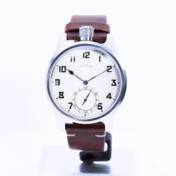 Wristwatch with a brown leather strap on a white background