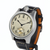 A Hamilton watch with a silver-toned metal case, a cream-colored dial, and a black leather strap with white stitching and a tan interior lining, shown on a plain white background.