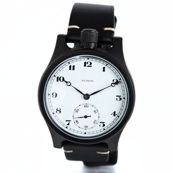 A black dial watch with a white face, black bezel, and black strap, photographed against a plain white background.