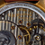 Close-up of a watch mechanism with visible branding and text.